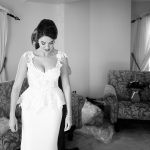 bride-getting-into-wedding-dress