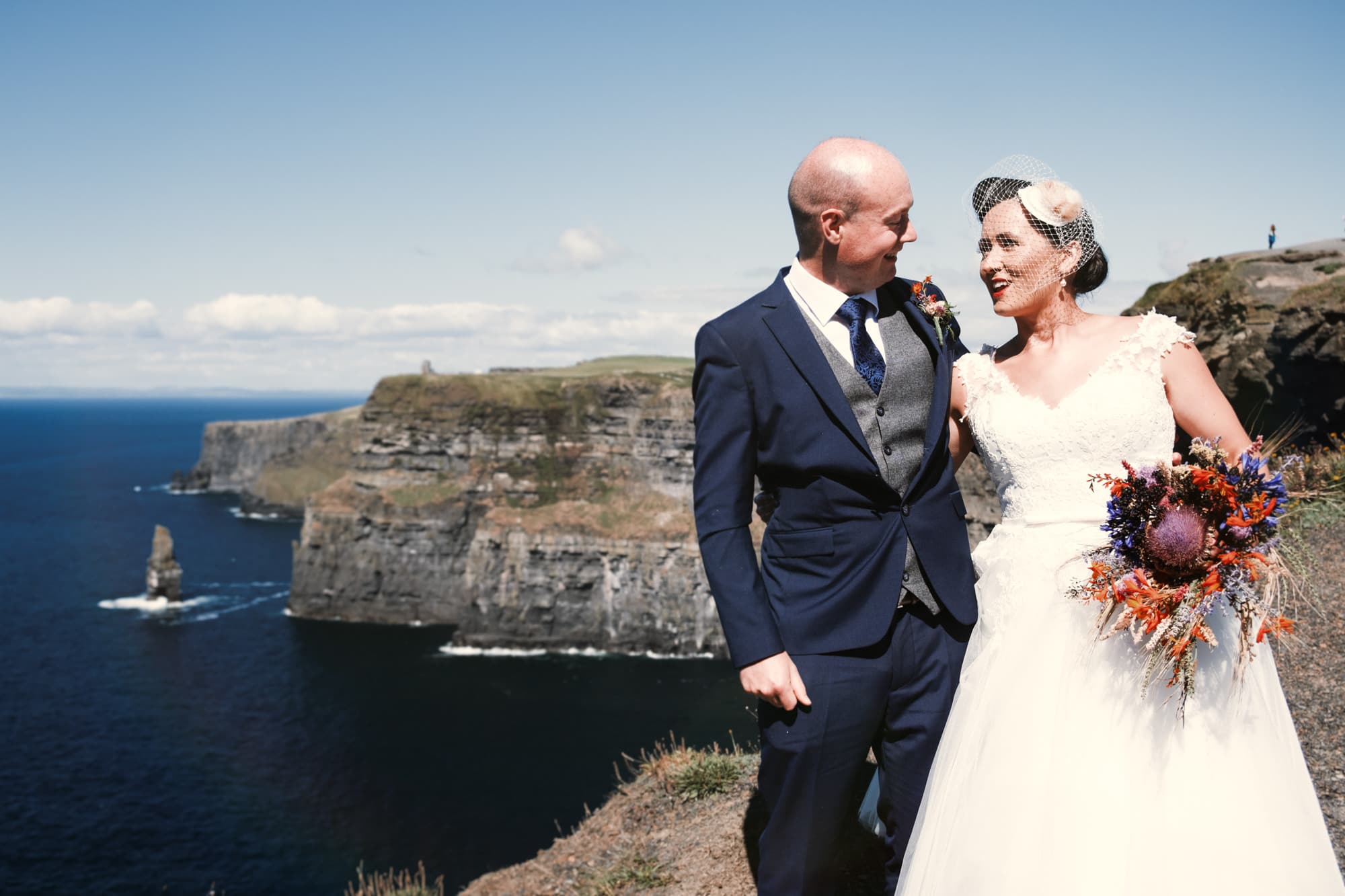 Bride and groom on the cliffs of moher. Rory O'Toole