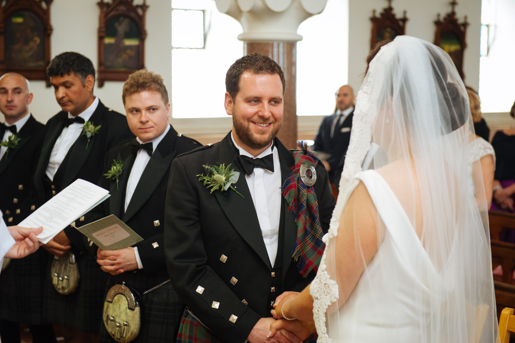 bride meets groom in church ballycotton